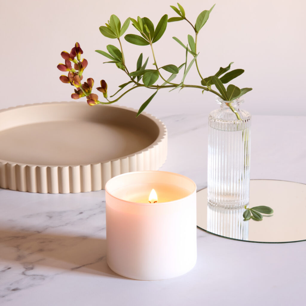 Cue Candle Company white candle on white marble