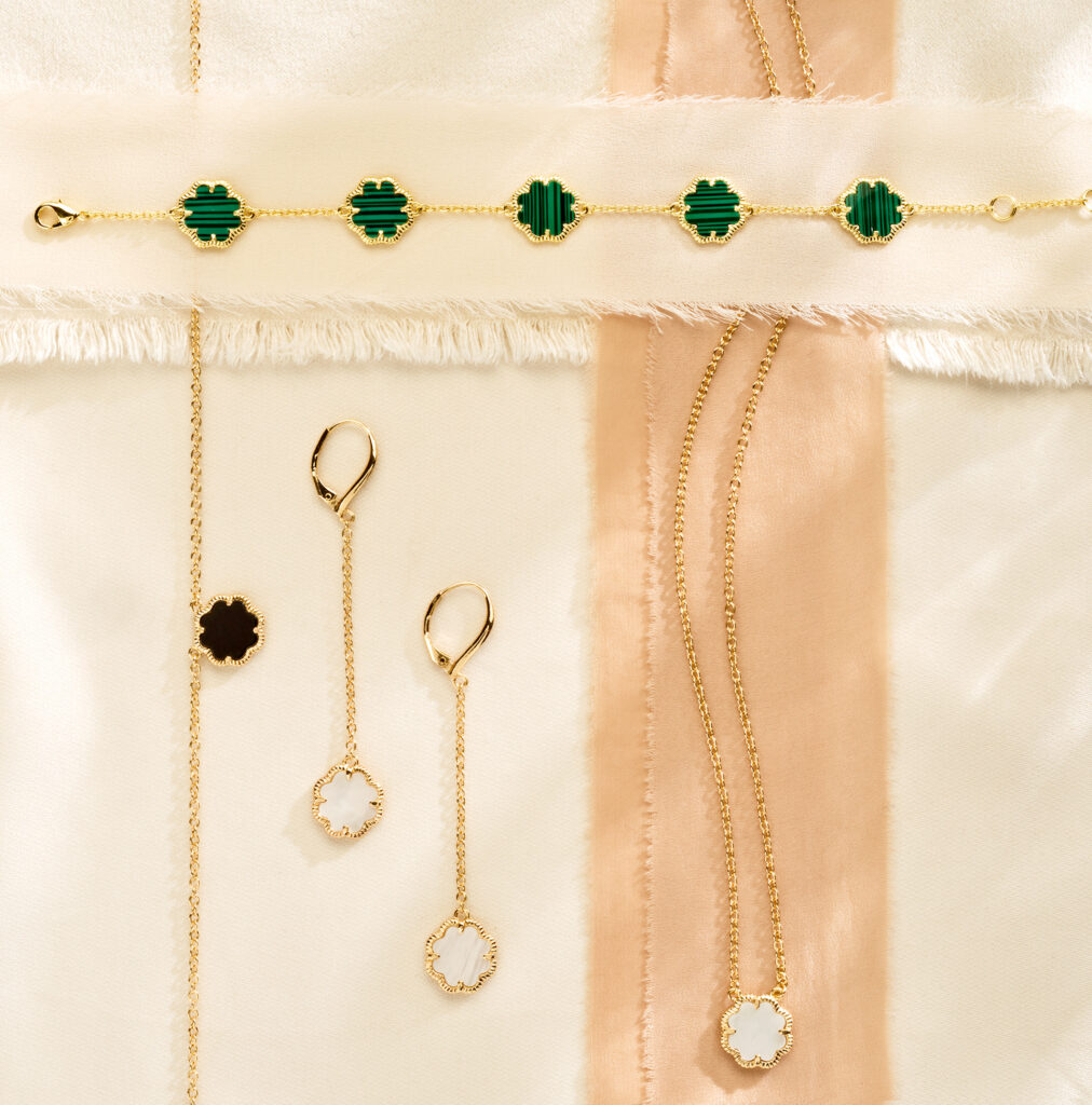 onyx, mother of pearl and malachite jewelry on fabric