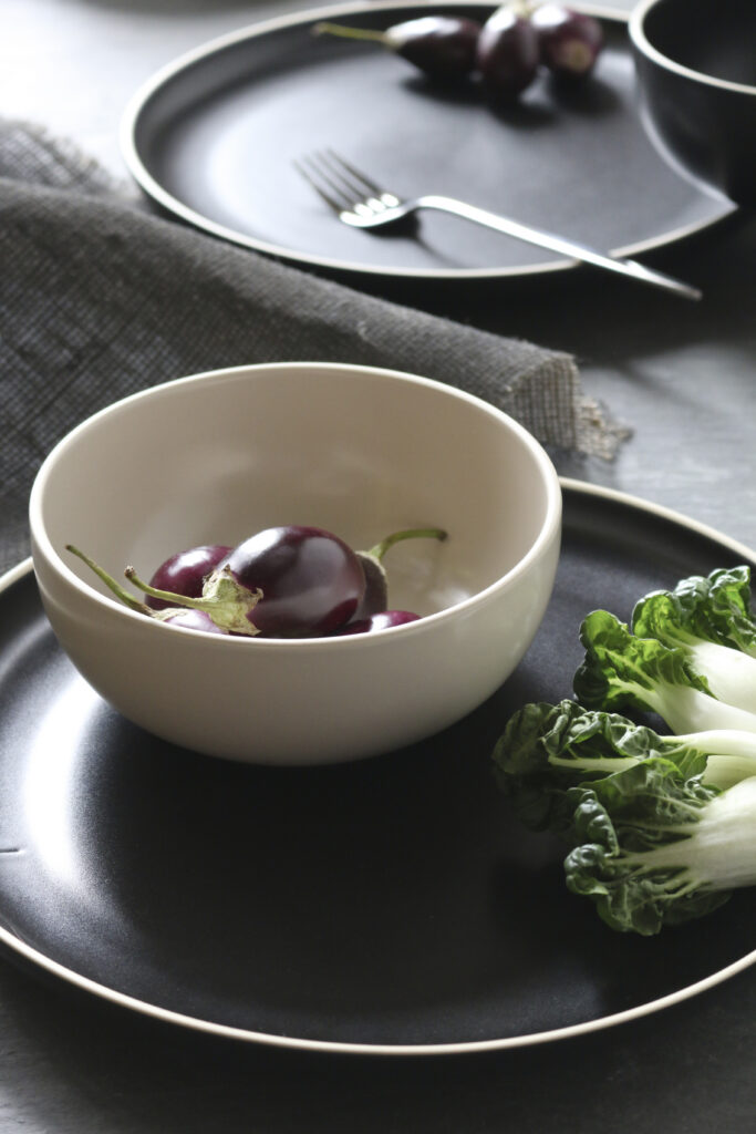 modern minimalistic dinnerware with earthy fresh vegetables