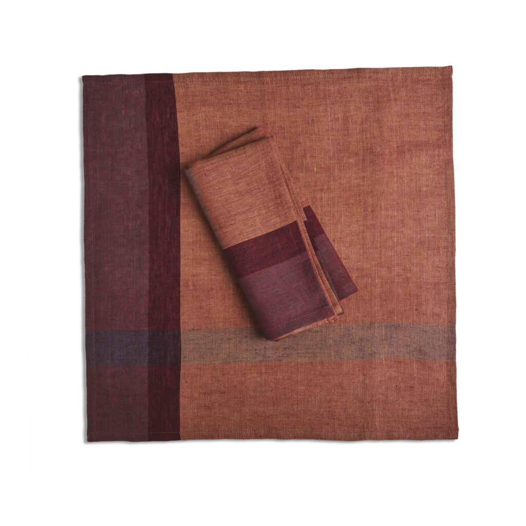 Sustainable Threads fair trade handwoven orange and red handwoven napkin set on white background