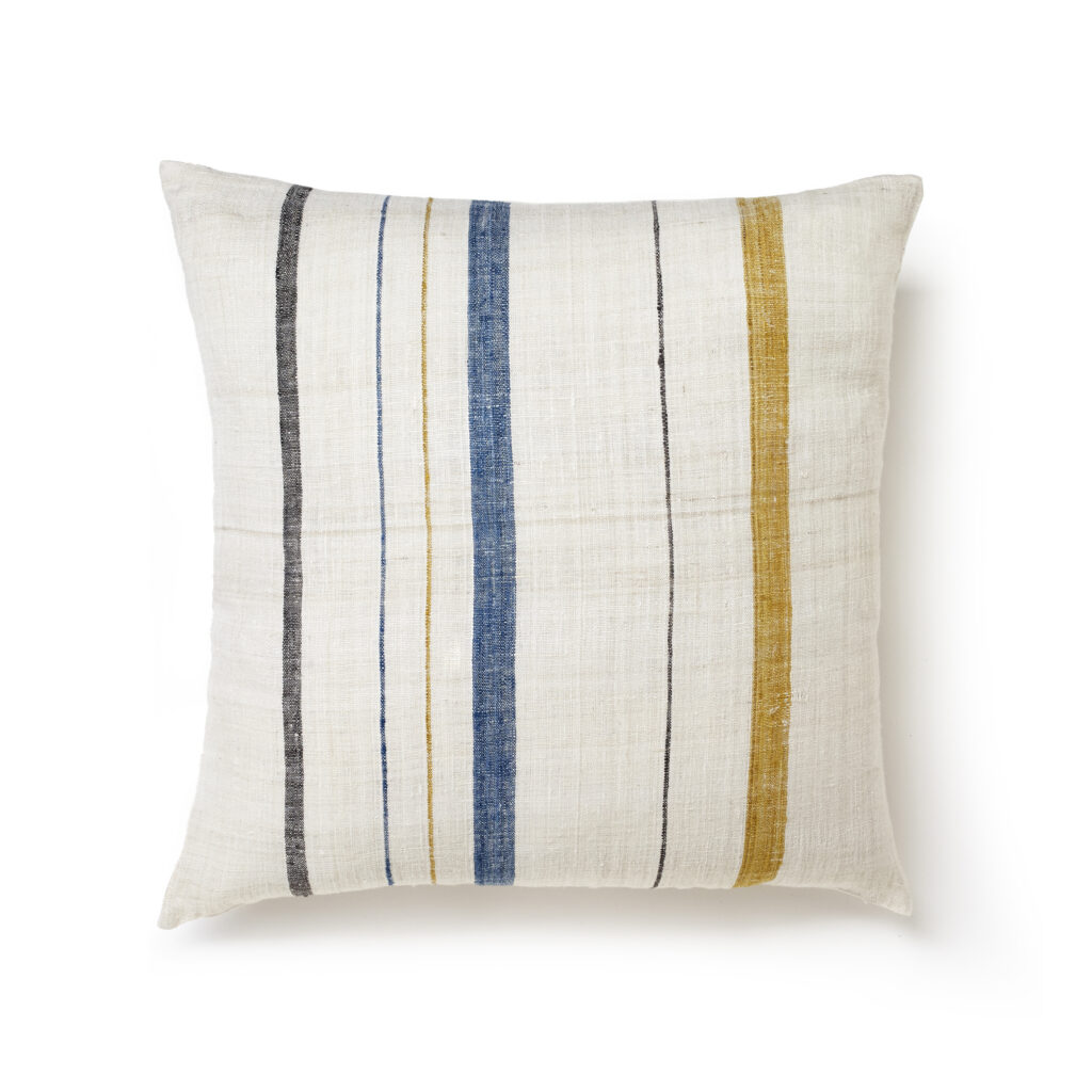 Sustainable Threads fair trade handwoven cream pillow cover with stripes on white background