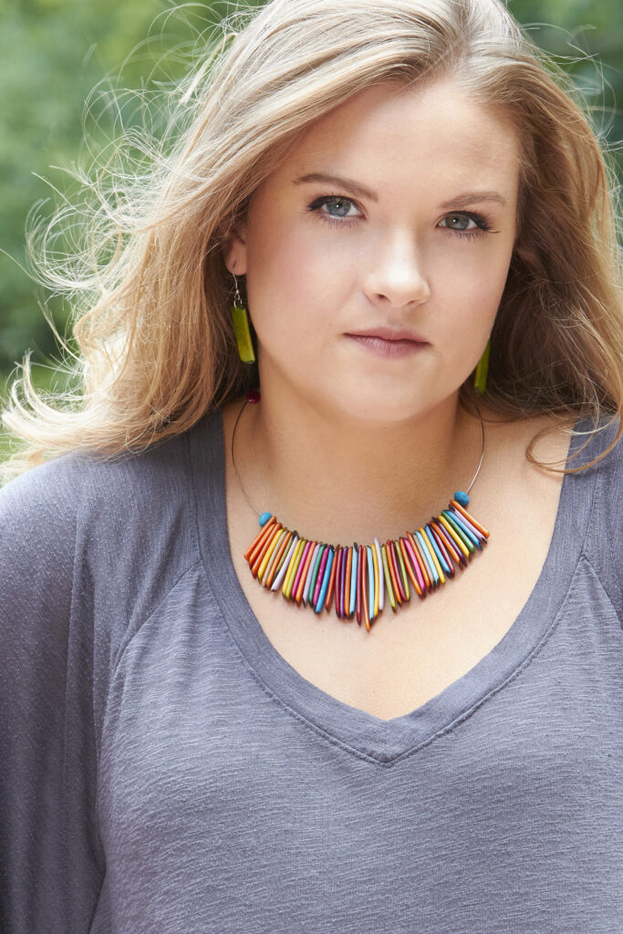 beautiful model wearing handcrafted fair trade tagua jewelry