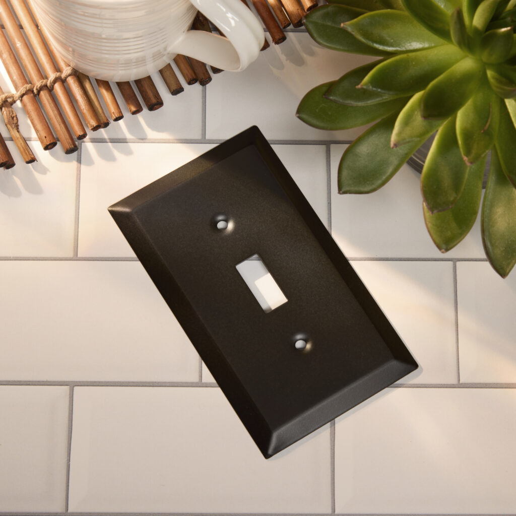 Amerelle switch plate on kitchen tile