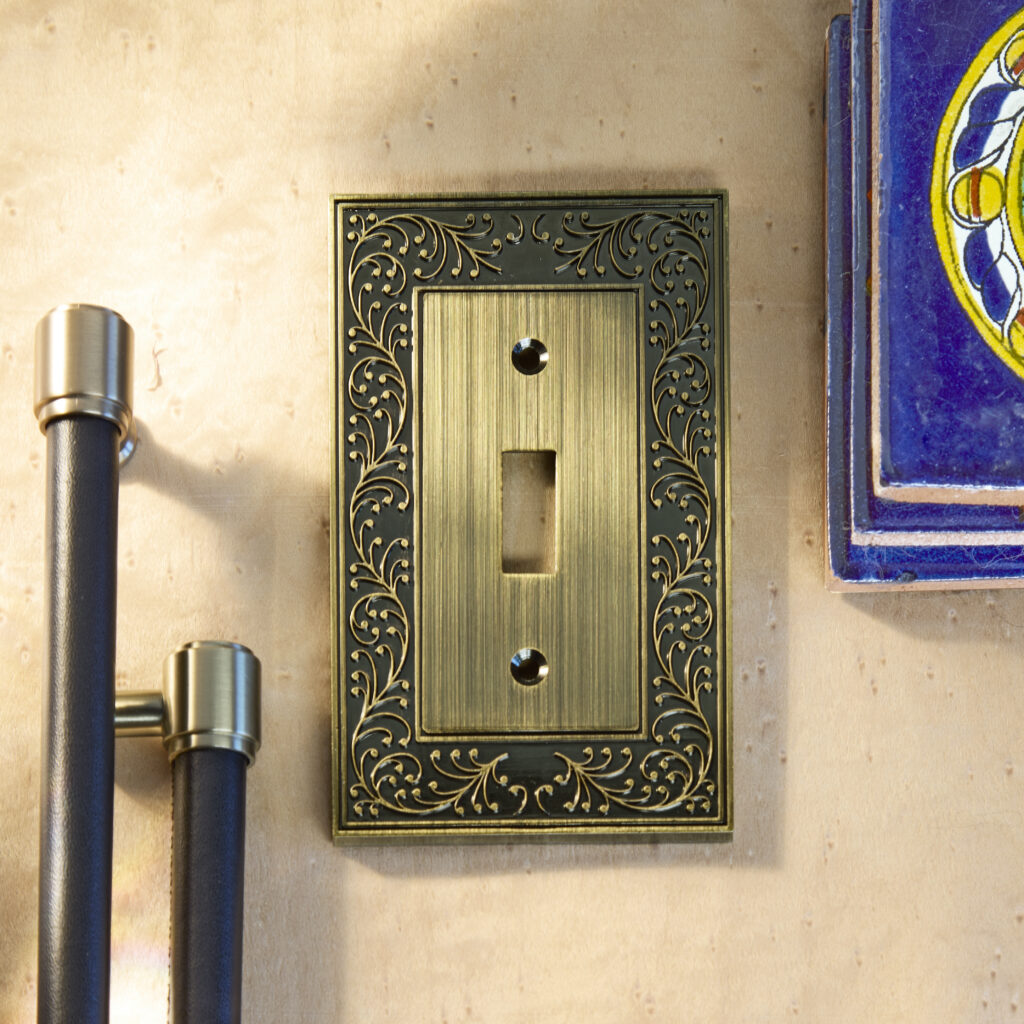 Amerelle switch plate with finishing samples on wood