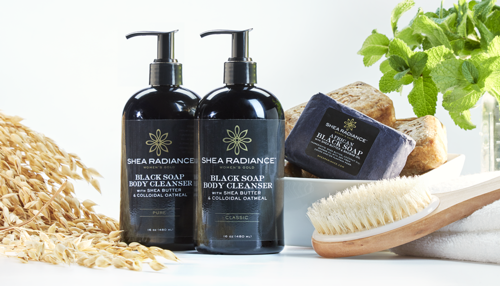 Shea Radiance black soaps and body brush on white background