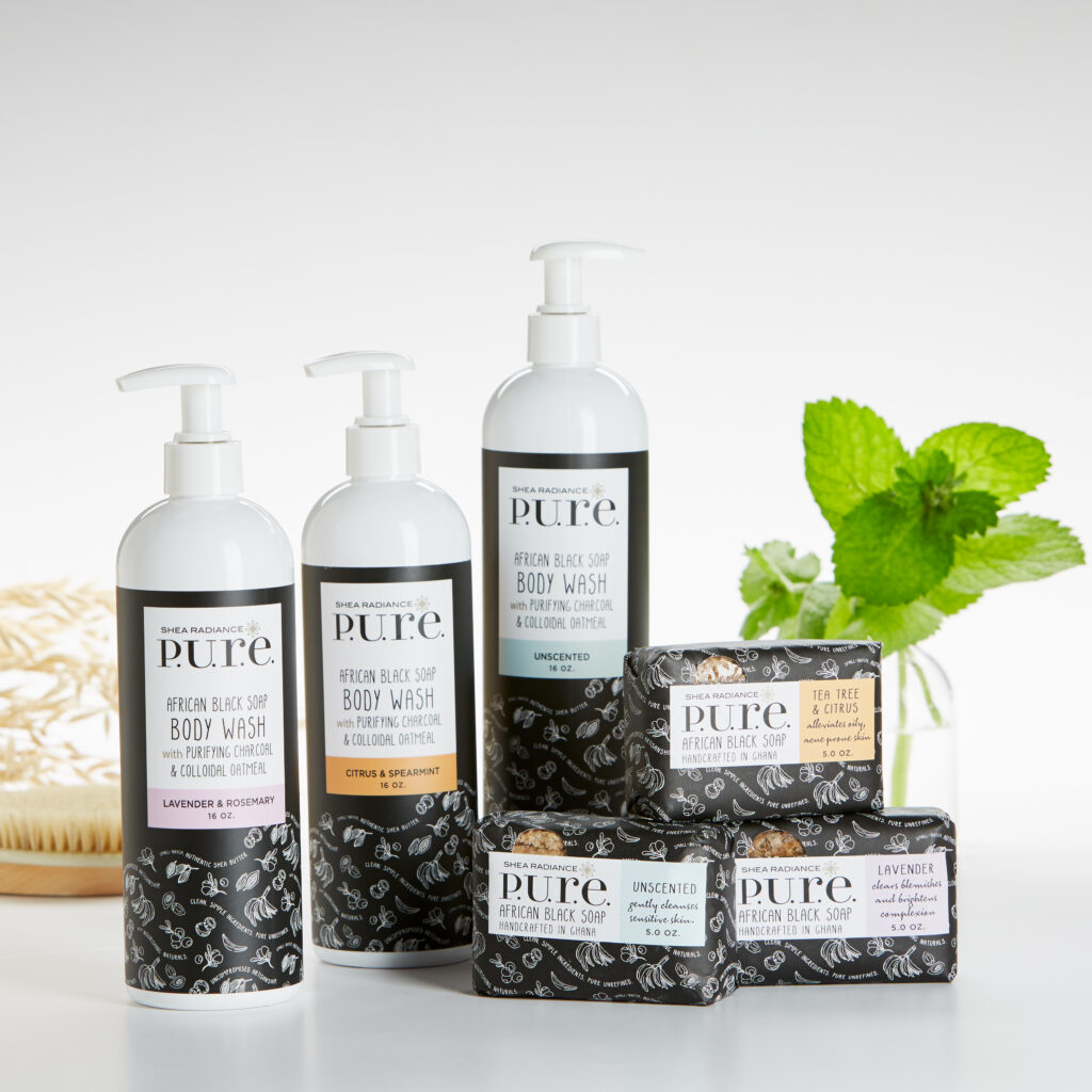 Shea Radiance black soaps and body brush on white background