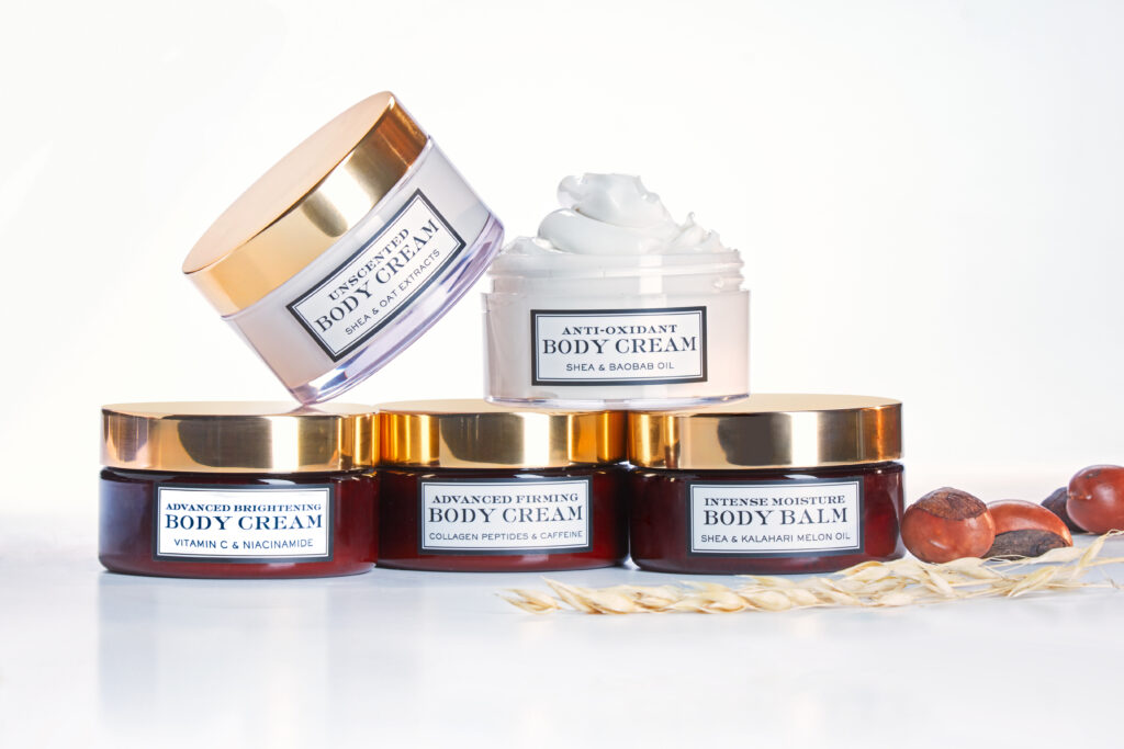 Shea Radiance beauty brand luxury packaging on dreamy white background