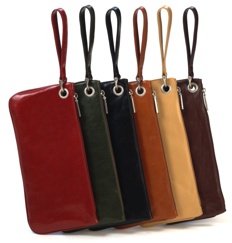 Hobo colorful leather clutch bags on white background