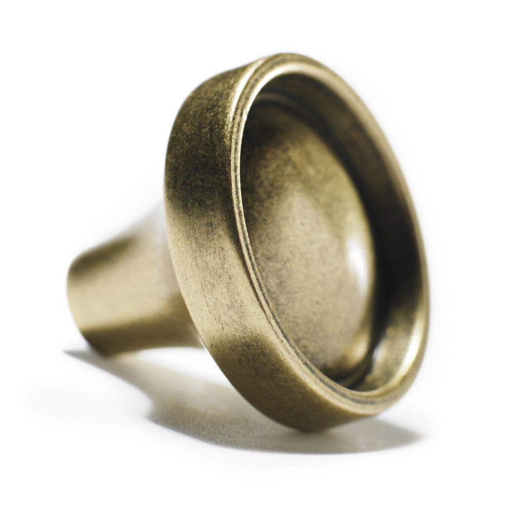 Amerock antique brass knob with dramatic lighting