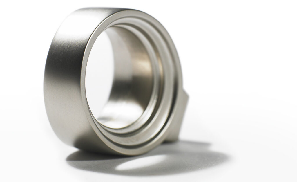 Amerock brushed nickel knob with dramatic shadow on white