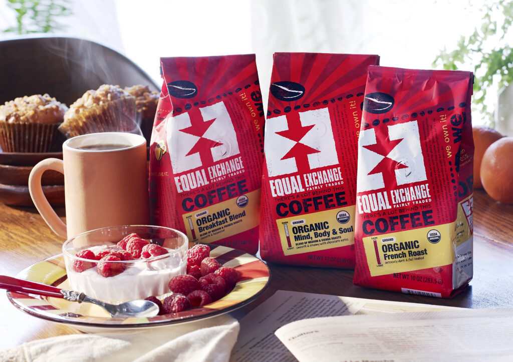 Equal Exchange Coffee packaging in breakfast scene with berries and yogurt