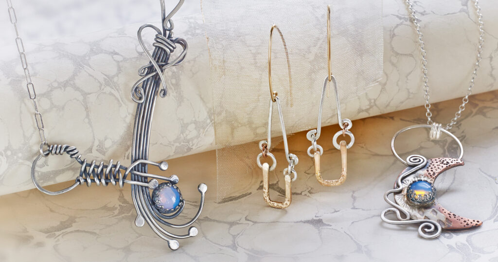 handcrafted earrings and pendants on marbled paper