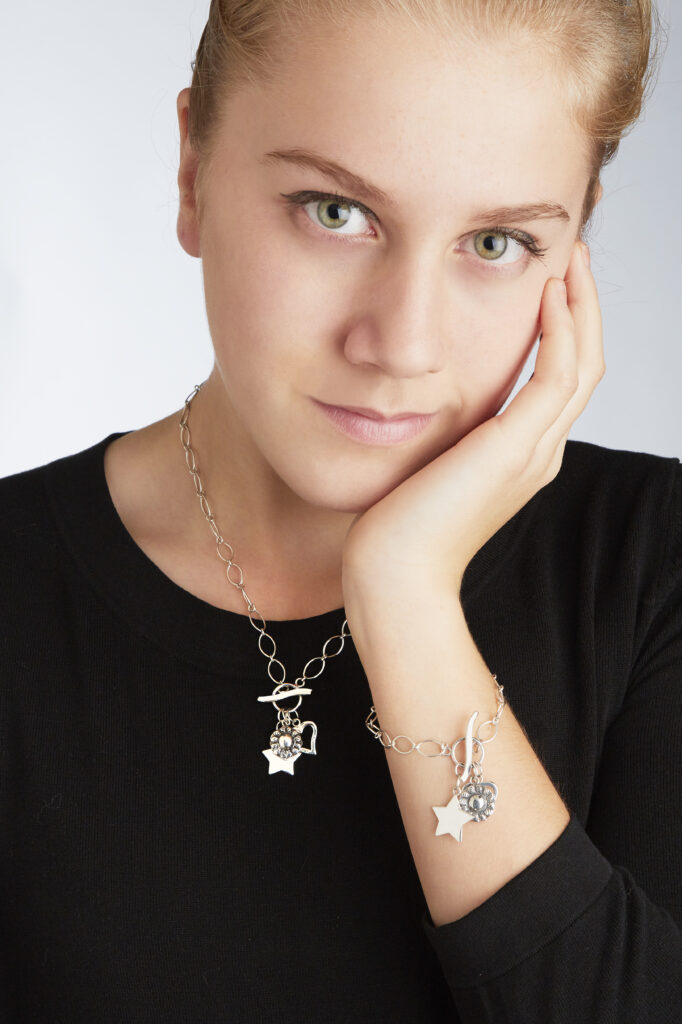 beautiful model wearing handcrafted fair trade jewelry