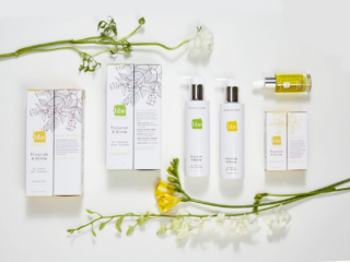 high end botanical beauty brand packaging with floral accents