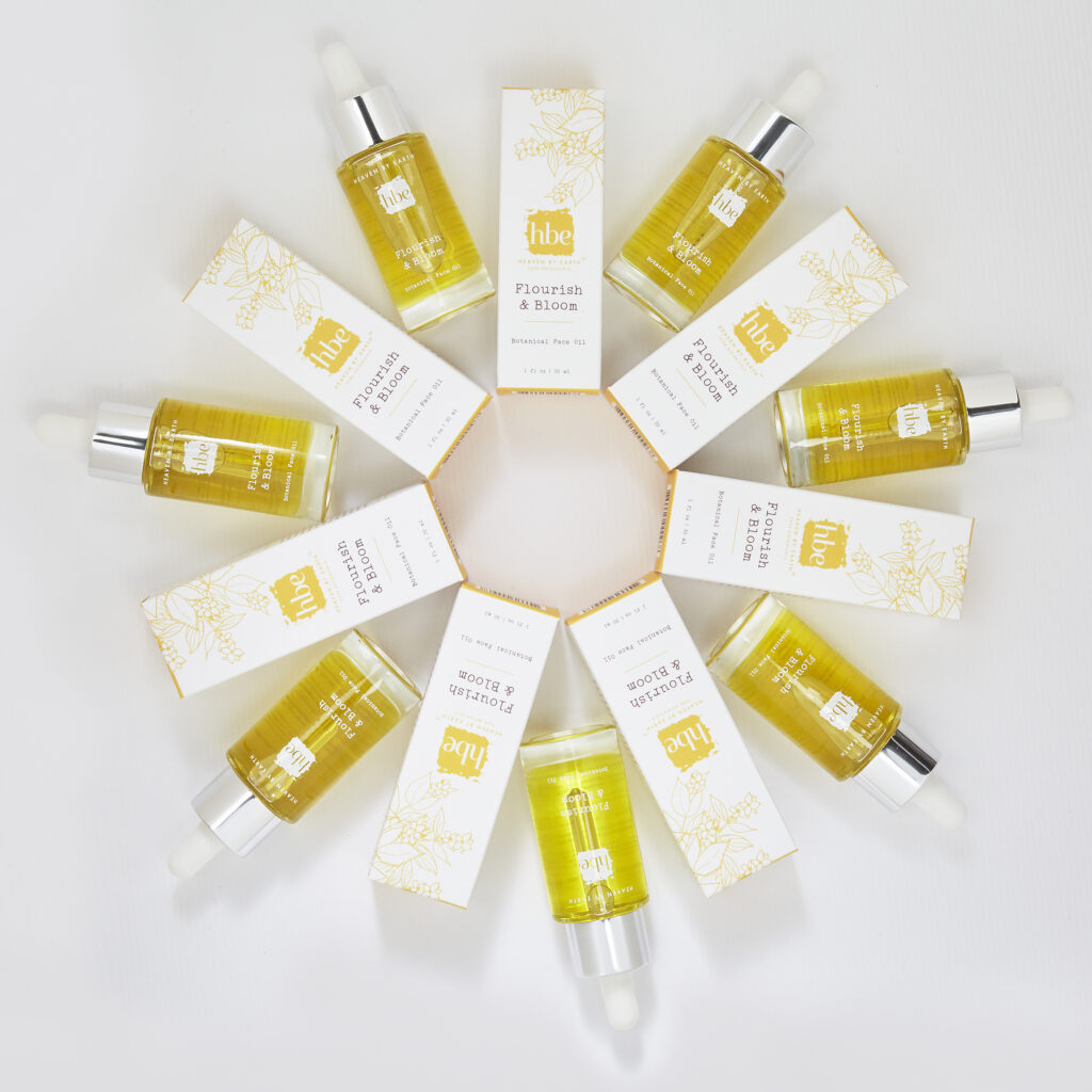 luxury beauty brand botanical oil on white in circle viewed from above