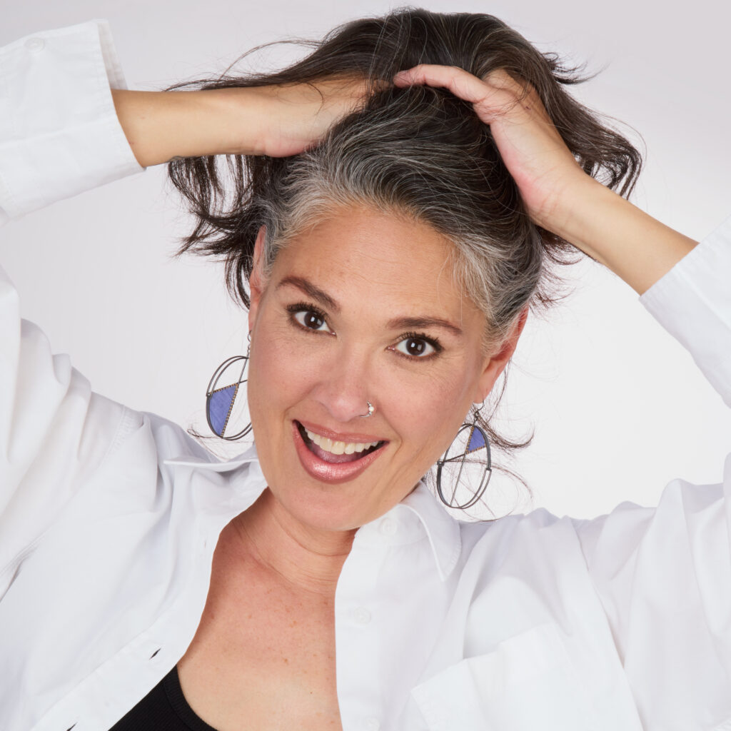 beautiful model wearing handcrafted jewelry having fun