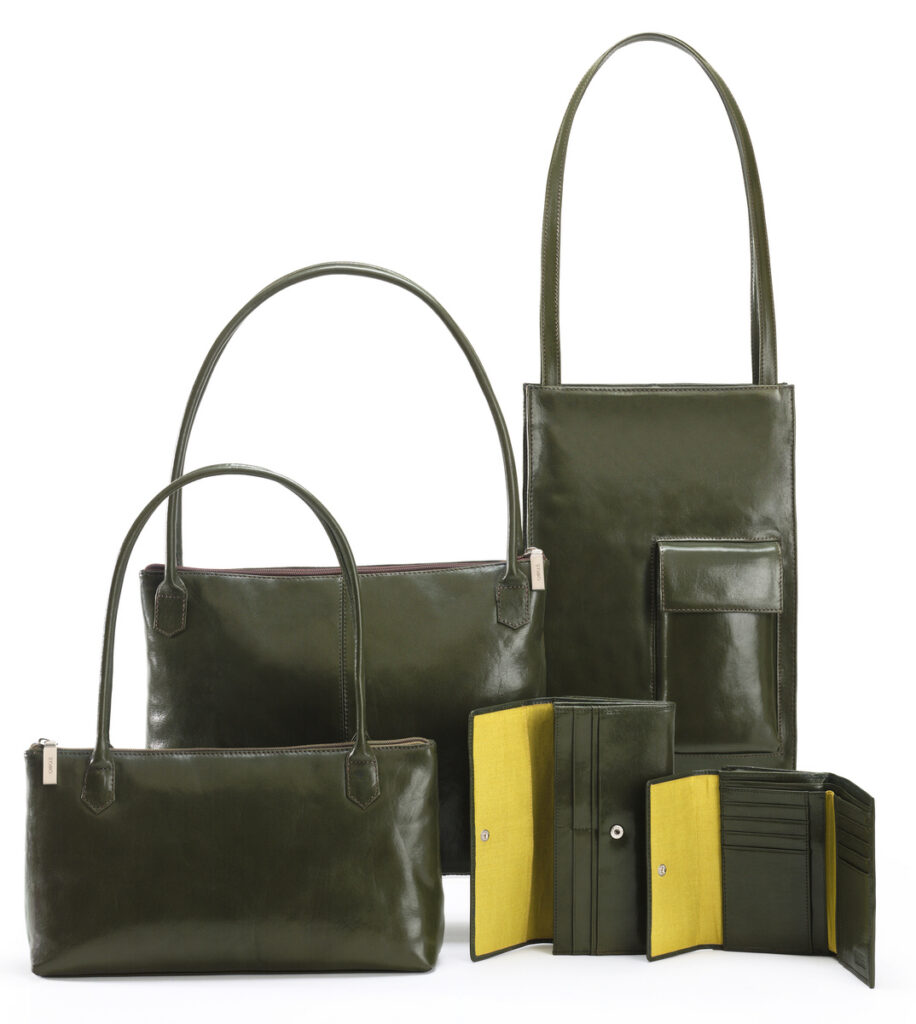Hobo green leather handbags on white background