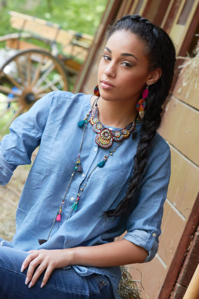 beautiful model wearing beaded fair trade jewelry