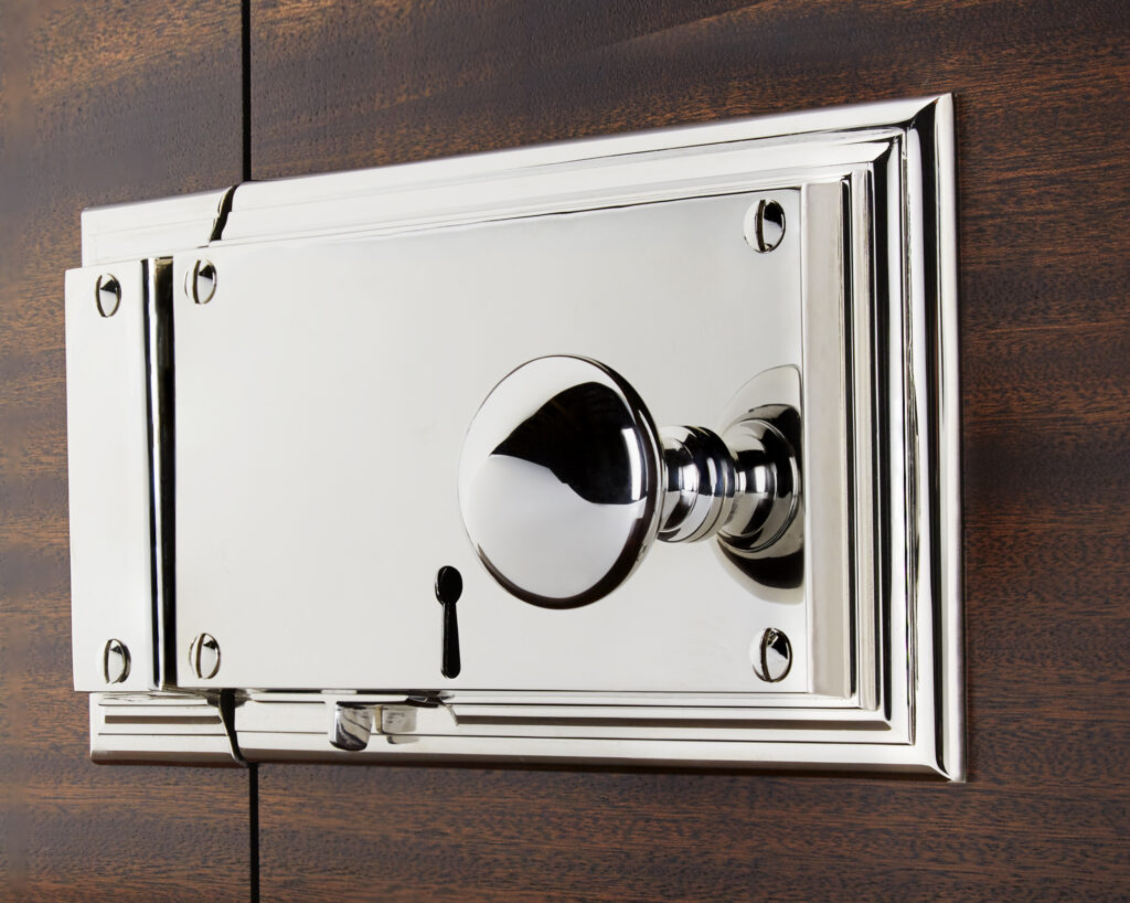 Michael Coldren Co. polished chrome lock set hardware on mohogany