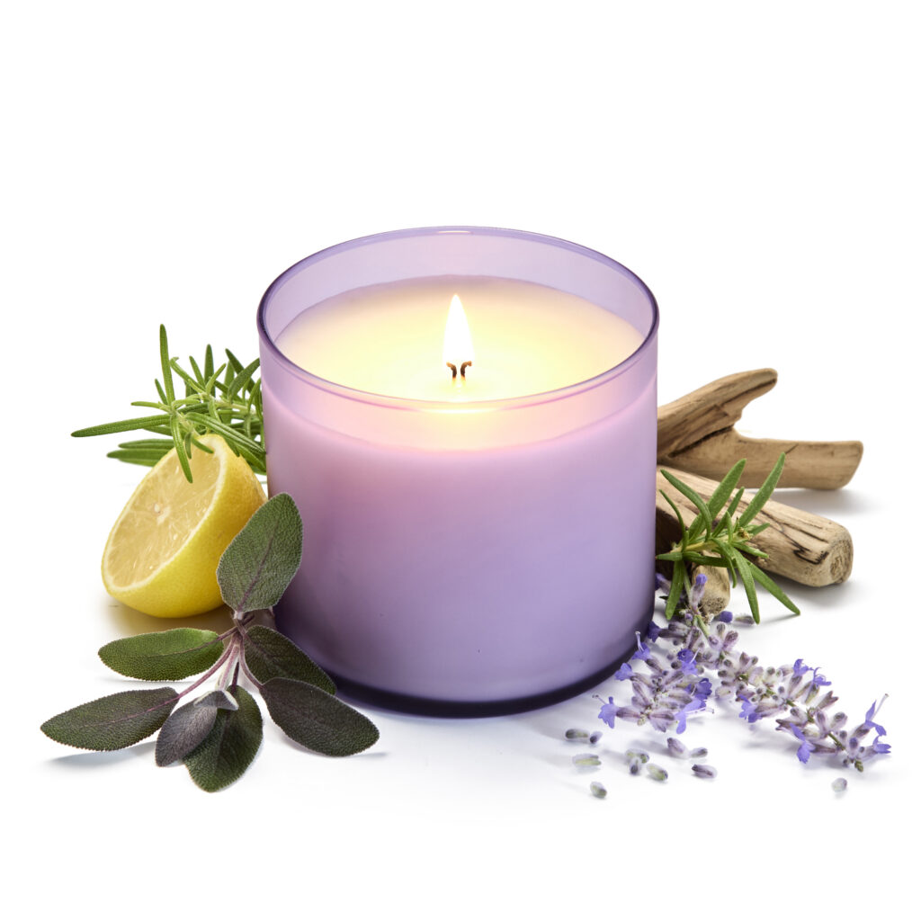 Cue Candle Company frosted purple candle with fresh herbs on white background