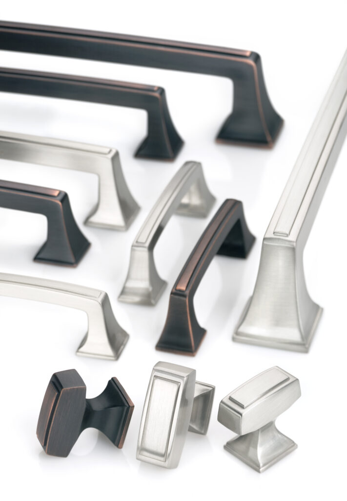 Amerock Mullholand hardware in various finishes artfully arranged together with soft lighting on a white background