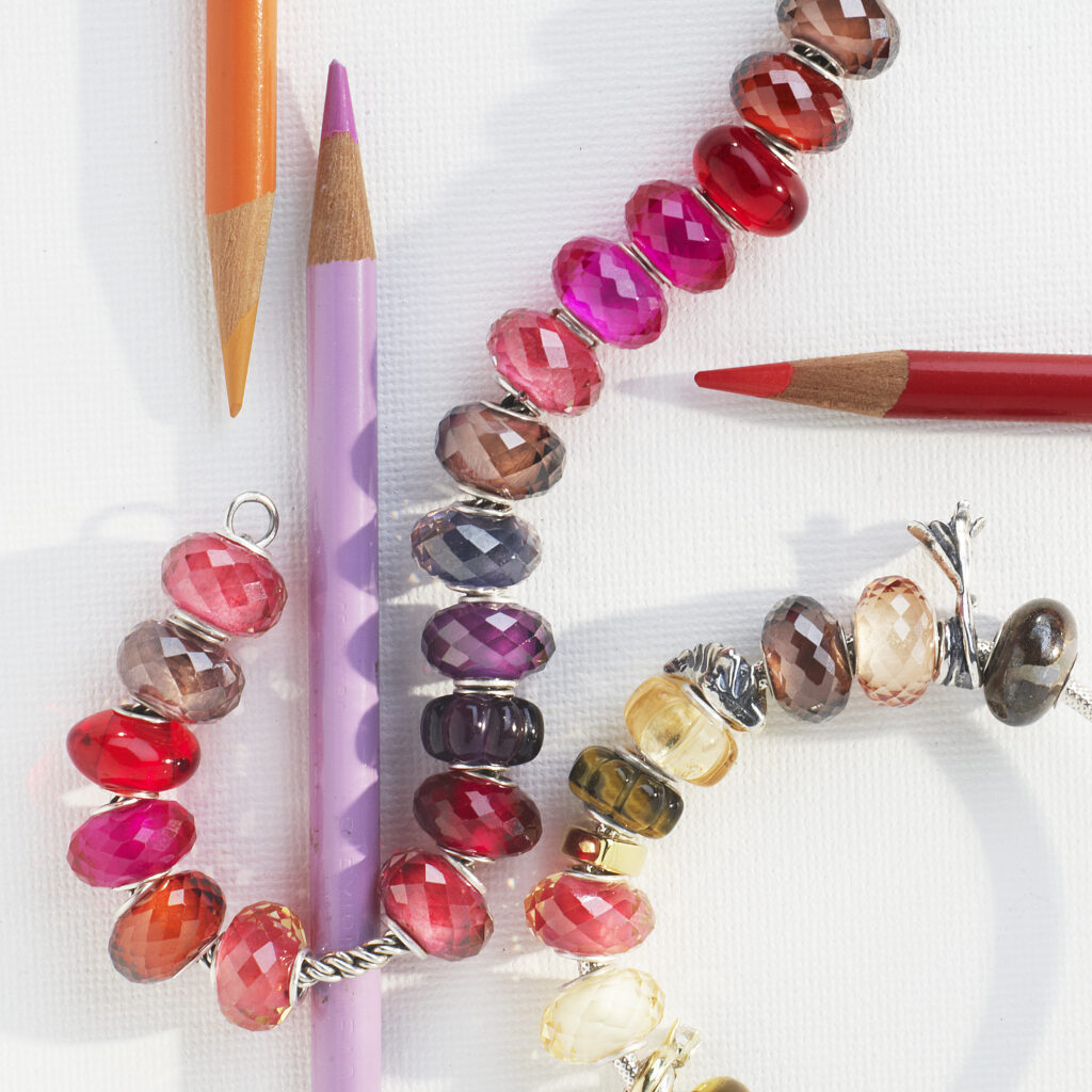 Colorful beaded bracelet with colored pencils