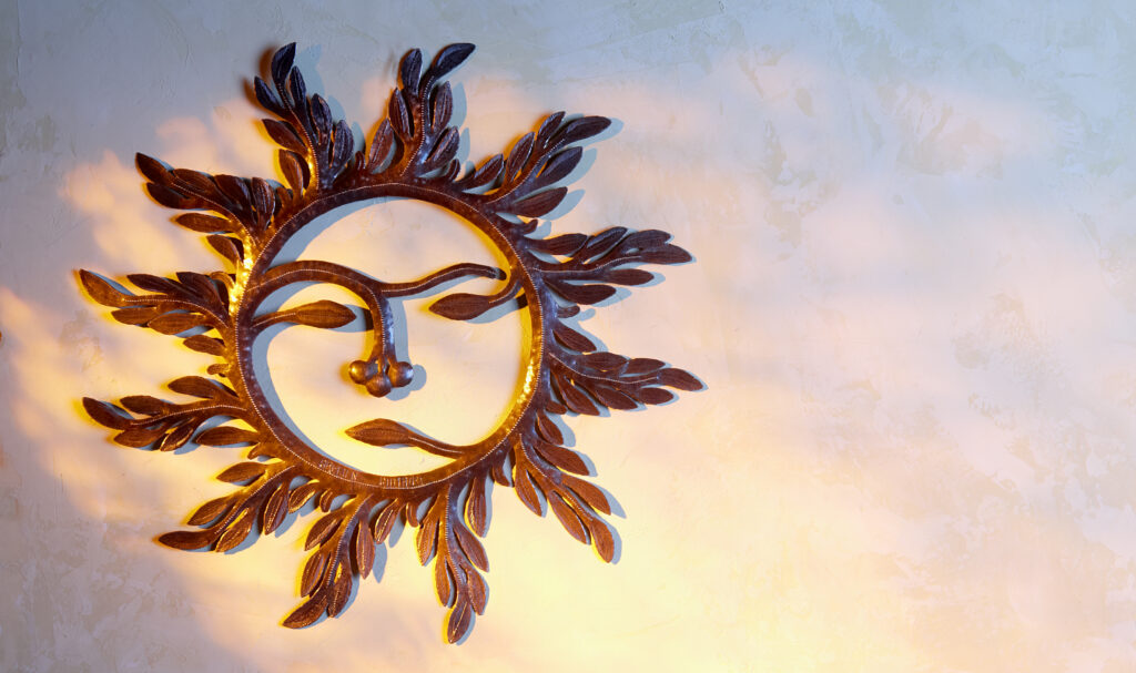 fair trade Hatian metal sculpture of sun face