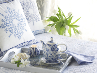 fair trade tea set and coordinating bedding in blue and white with white tulips