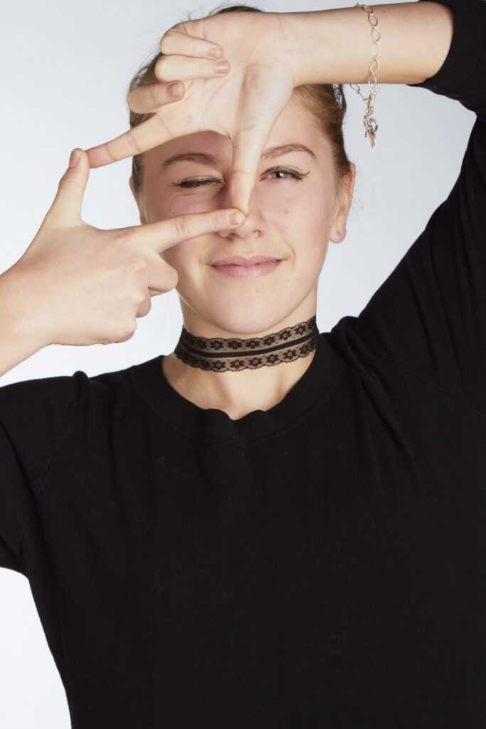 beautiful model wearing handcrafted fair trade jewelry having fun