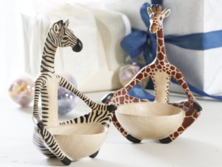 whimsical giraffe and zebra bowls in dreamy white holiday scene