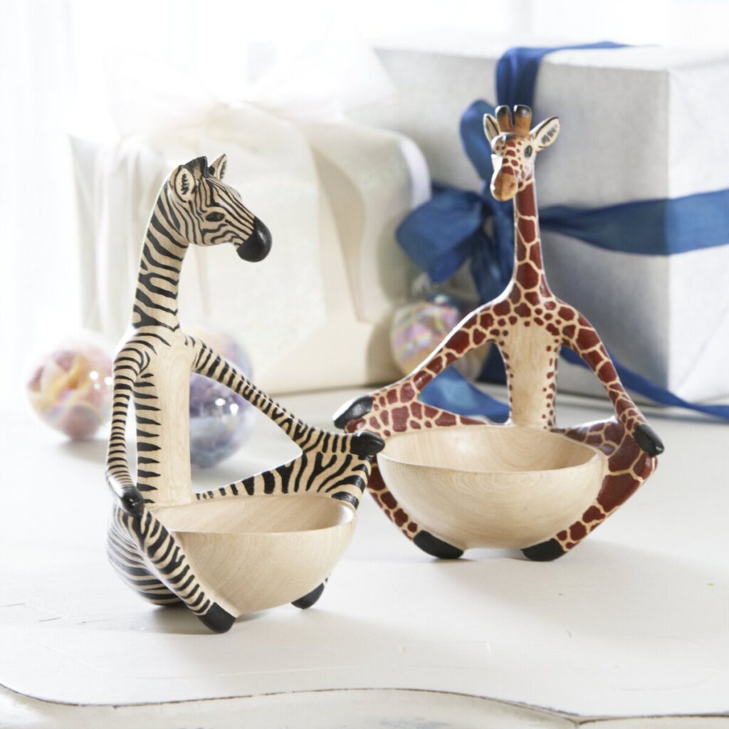 whimsical giraffe and zebra bowls in dreamy white holiday scene