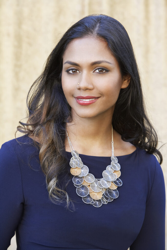 beautiful model wearing handcrafted fair trade jewelry