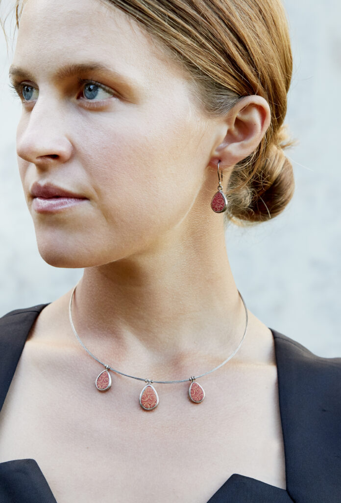 beautiful model wearing handcrafted fair trade jewelry