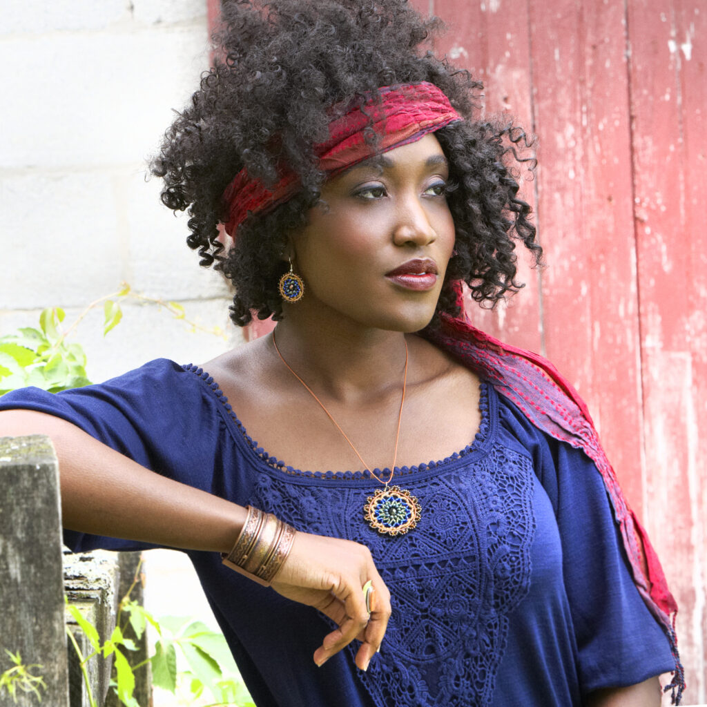 beautiful model wearing handcrafted fair trade jewelry