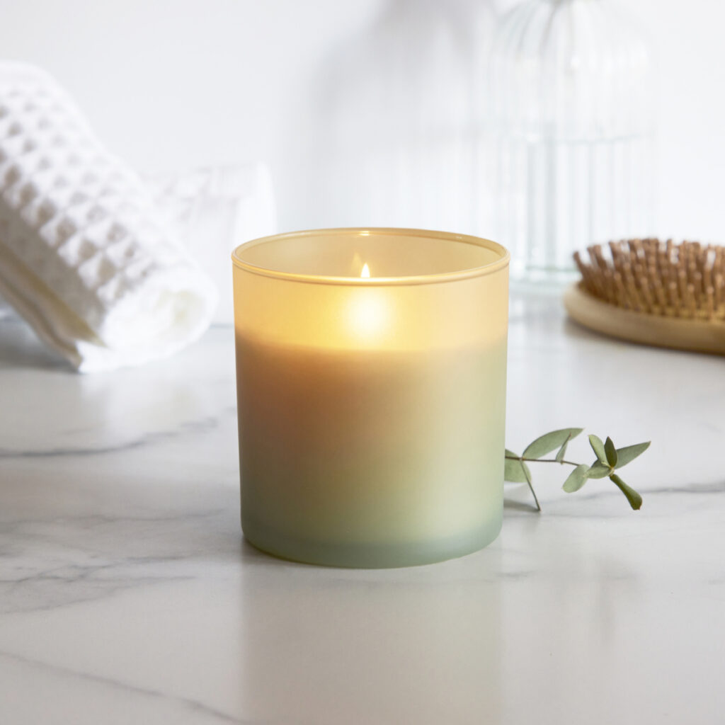 Cue Candle Company frosted sage candle in spa setting