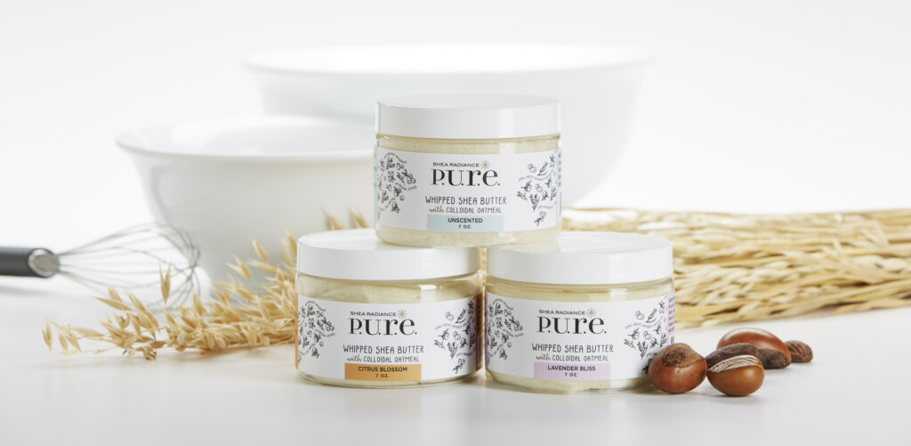 Shea Radiance beauty brand luxury packaging on dreamy white background