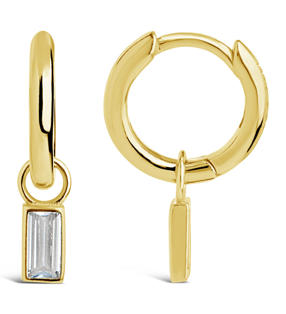 gold hoop and CZ earrings on a white background