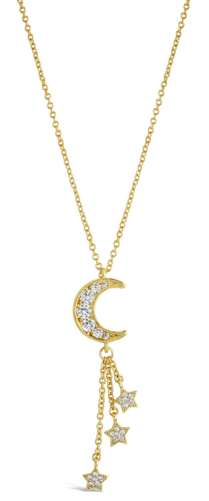 gold chain with moon and stars pendant on a white background