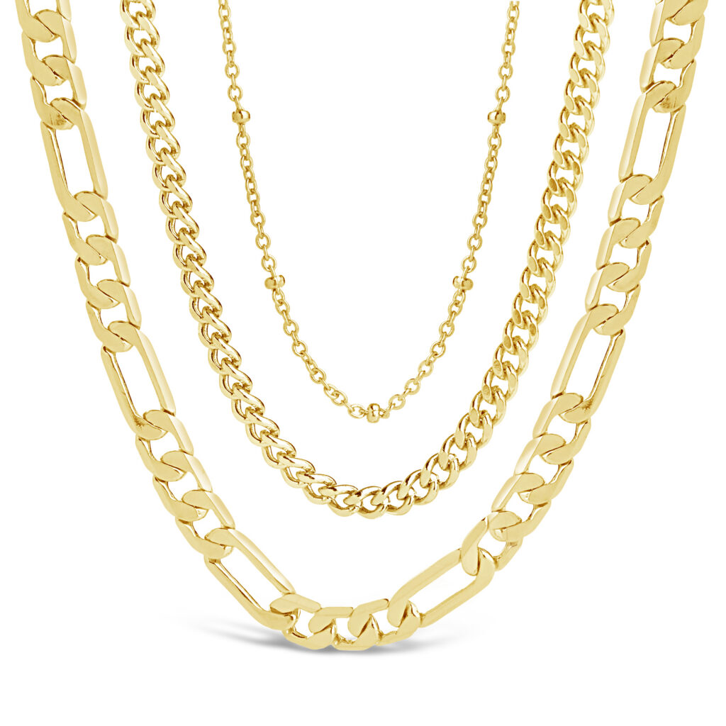 gold layer chains on white background