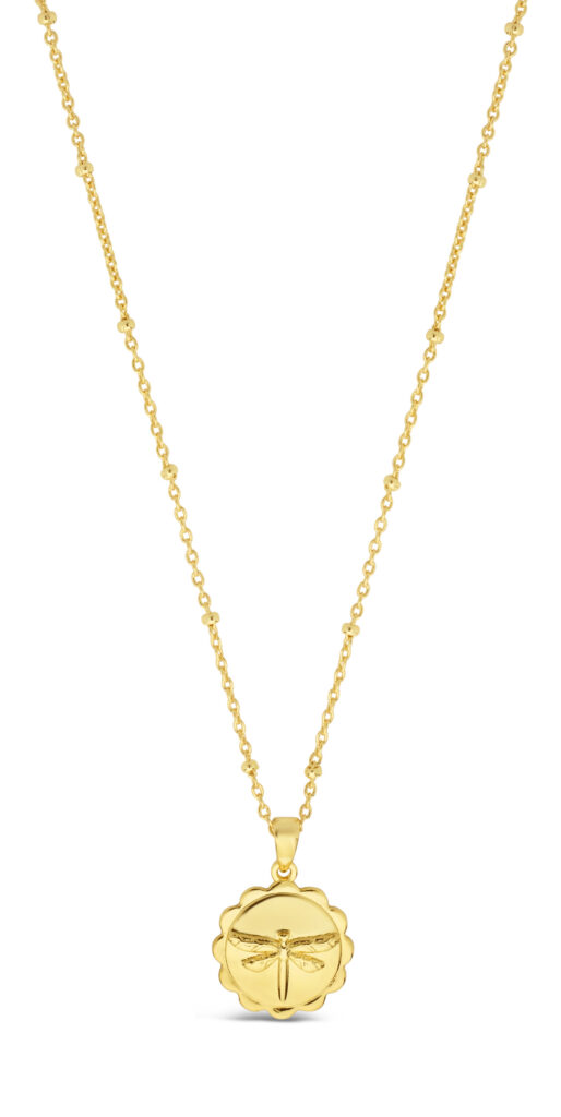 gold pendant with dragonfly on white background