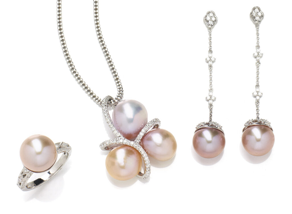 blush pearl and diamond sethandcrafted necklace with blue and green gems on a white background