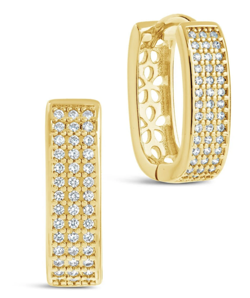 gold and diamond hoop earrings on a white background