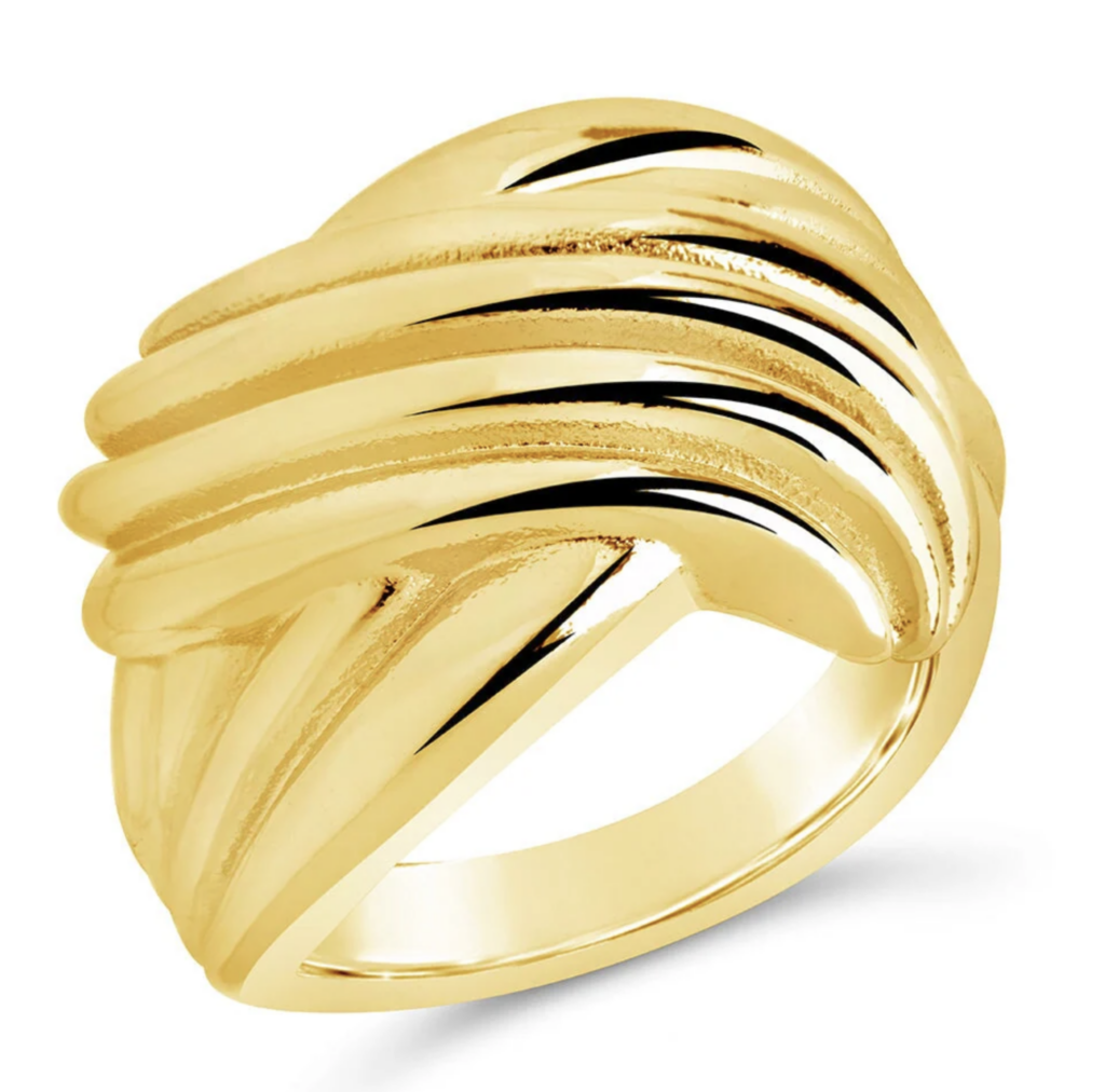 gold cocktail ring on a white background